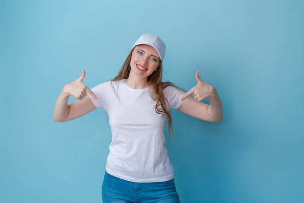 Shopping concept Surprised cute caucasian girl checking discounts pointing