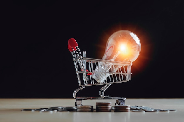 Shopping idea concept  wiht coins stack on wood table