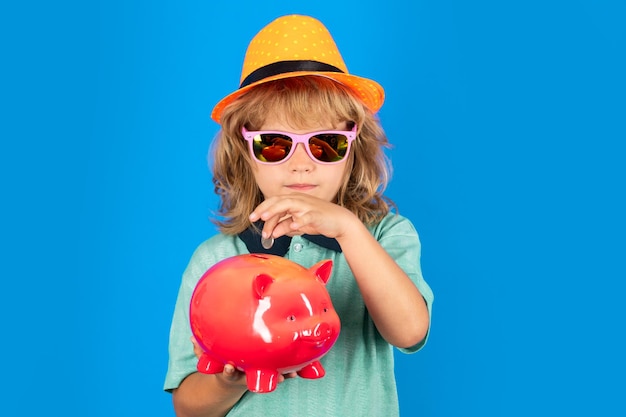 Shopping Kid saving coin money with piggy bank Cash and investment Boy collecting money to money