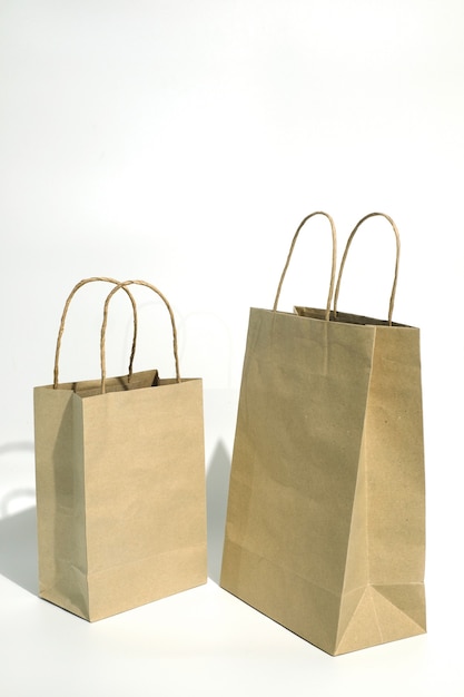 Shopping paper bag on white.