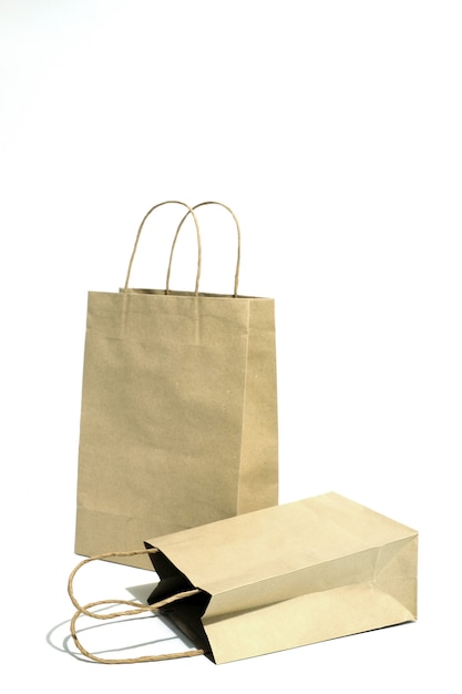 Shopping paper bag on white.