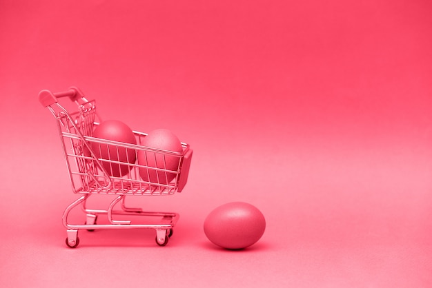 Shopping toy trolley with eggs