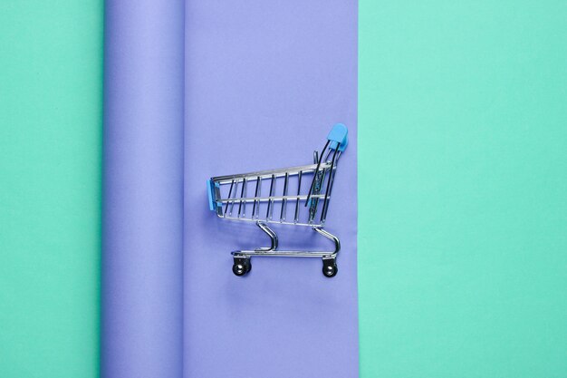 Shopping trolley on wrapped paper 
