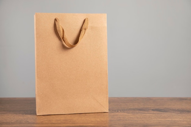 Shopping vintage bag on table