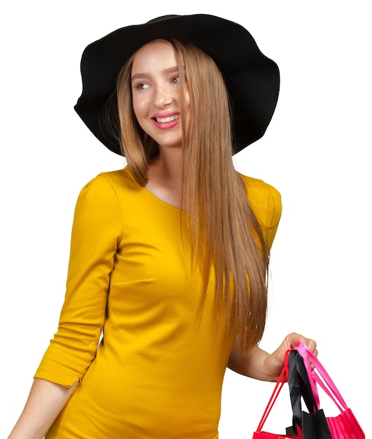 Photo shopping woman holding shopping bags