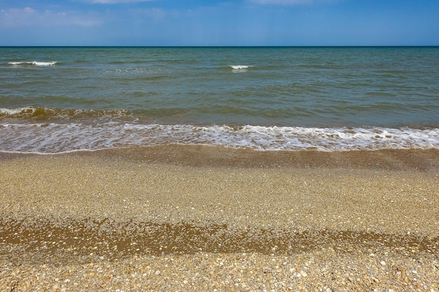 The shore of the Caspian Sea with shells Dagestan Russia 2021