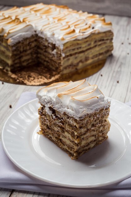 Shortbread cake with cream with condensed milk chocolate and nuts