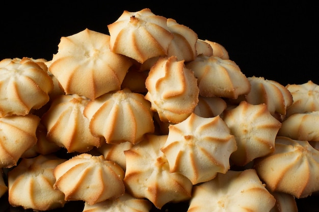 Shortbread cookie closeup on a dark background