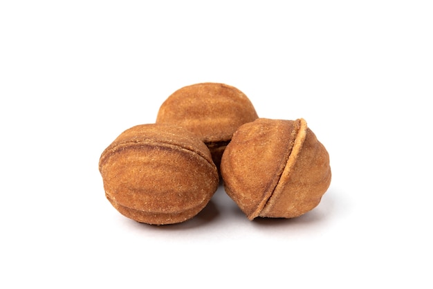 Shortbread in shape nut with caramel isolated on white.