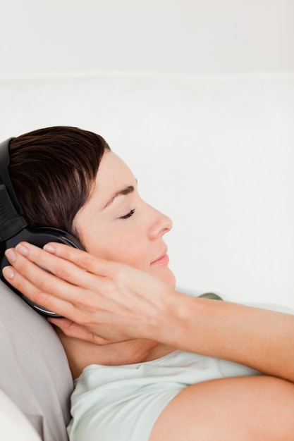 Shorthaired woman enjoying some music