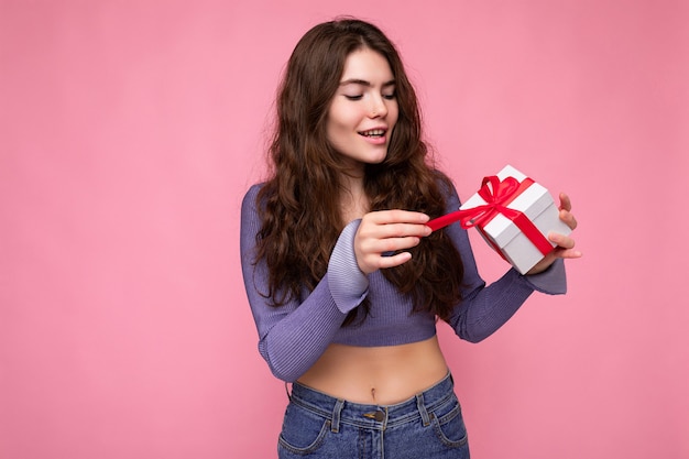 Shot of attractive positive smiling young brunette woman