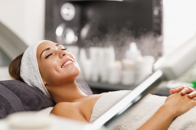 Shot of a beautiful young woman on a facial treatment at the beauty salon.