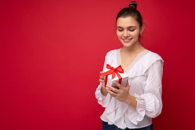 Shot of charming happy smiling young brunette woman