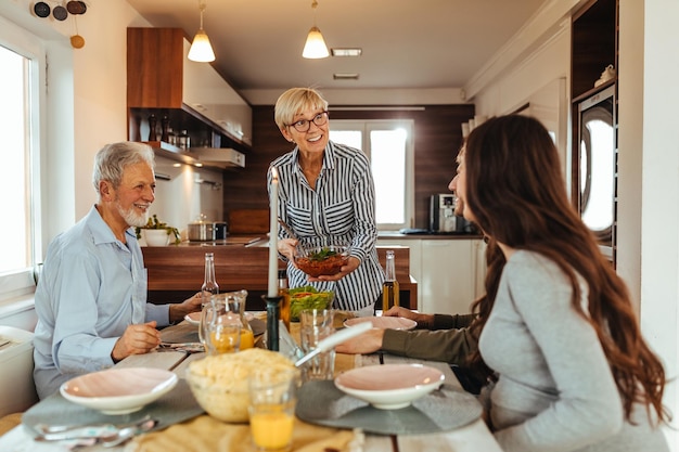 Shot of a family having a meal together around a dining table