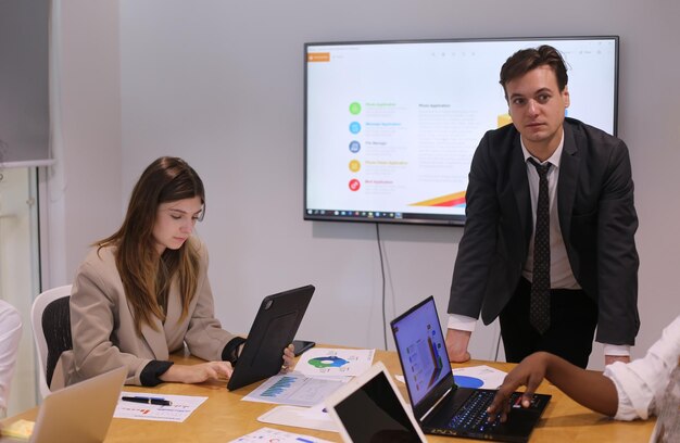 Shot of a group of businesspeople in a meeting at work