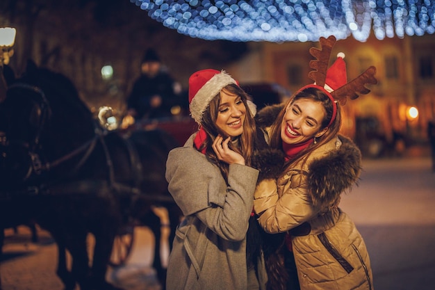 Shot of a group of cheerful young female friends having fun at a night out.