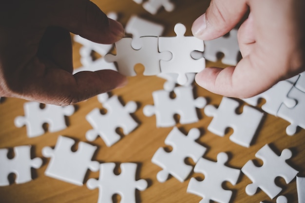 Shot of hand holding puzzle