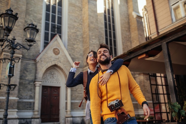 Shot of a happy young couple having fun while sightseeing in a foreign city