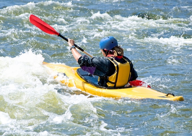 A shot of the kayaker on the rough water