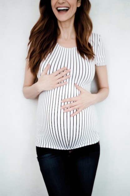 Shot of a pregnant woman holding her growing belly in her hands created with generative ai