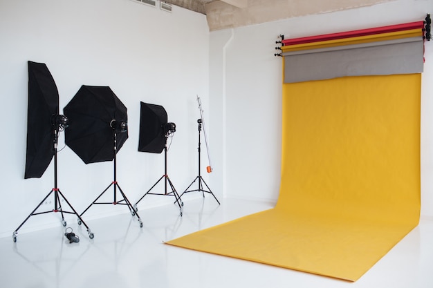 Photo shot of studio with modern interior and lightning equipment