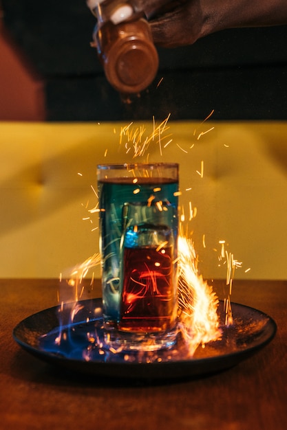 Premium Photo | A shot with fire and cinnamon