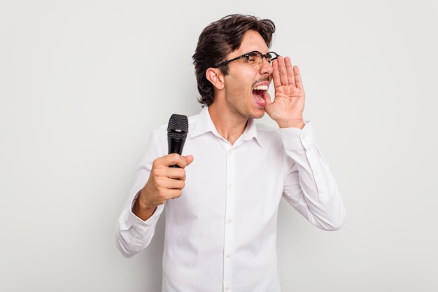 Shouting and holding palm near opened mouth