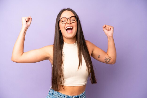 Shouting triumphantly looking like excited happy and surprised winner celebrating