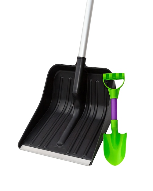 Shovel for snow and a children's toy a spade