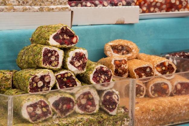 A showcase with oriental sweets Turkish delight and pastalar on the market