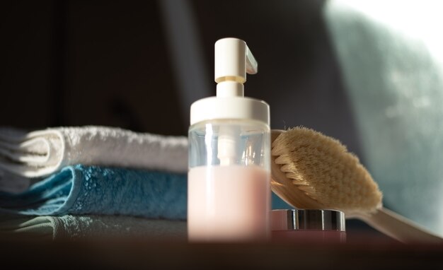 Shower facilities and a stack of clean towels in the bathroom Body care concept