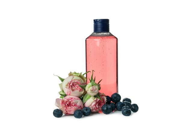 Shower gel, roses and blueberry isolated on white background