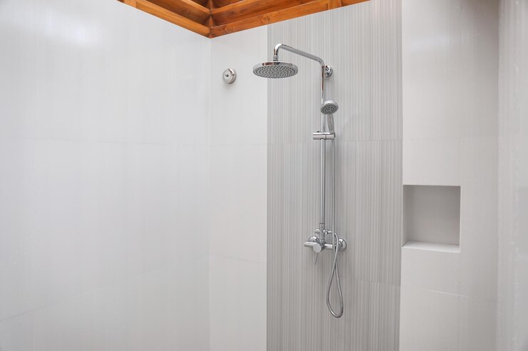 Photo shower in modern hotel bathroom