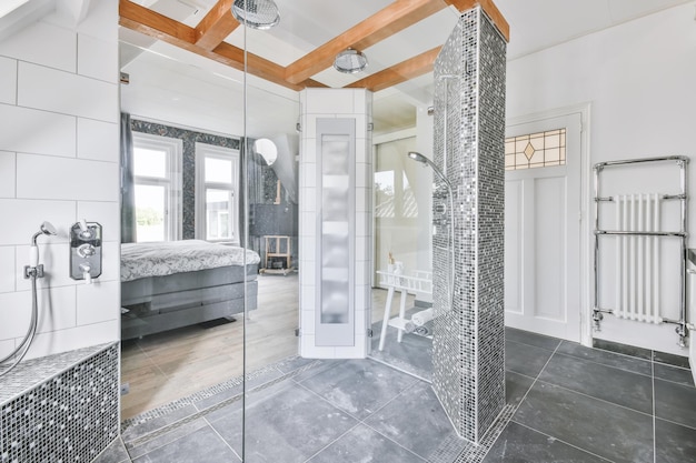 Shower room with glass doors leading to the bedroom