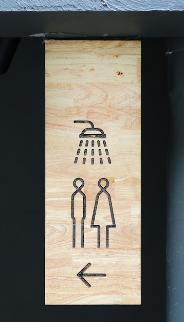 Photo shower sign on wood board