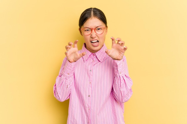 Showing claws imitating a cat aggressive gesture