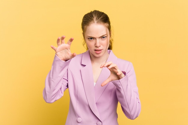 Showing claws imitating a cat aggressive gesture