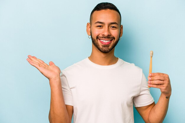 Showing a copy space on a palm and holding another hand on waist