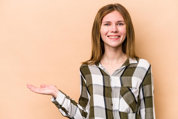 Showing a copy space on a palm and holding another hand on waist