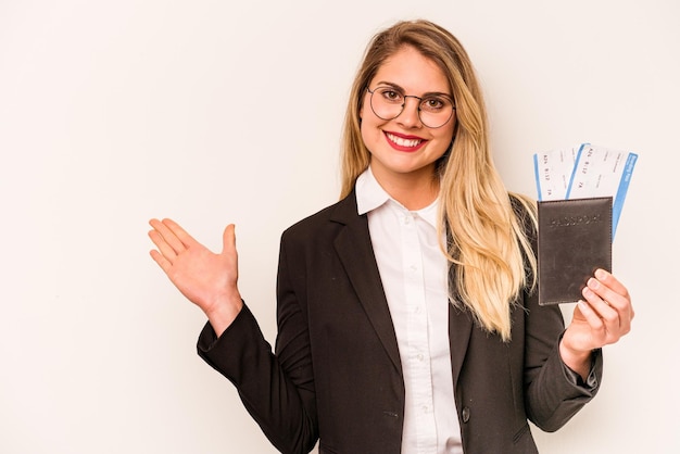 Showing a copy space on a palm and holding another hand on waist