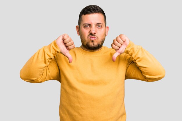 showing a dislike gesture thumbs down disagreement concept