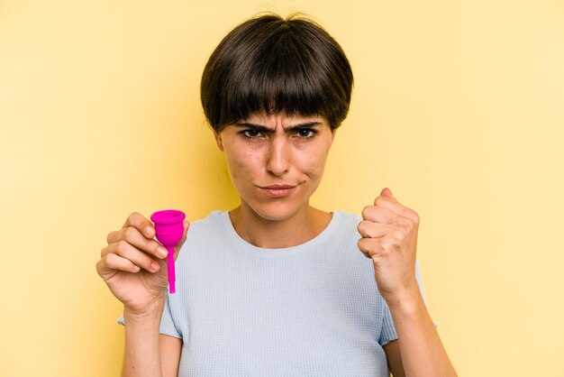 Showing fist to camera aggressive facial expression