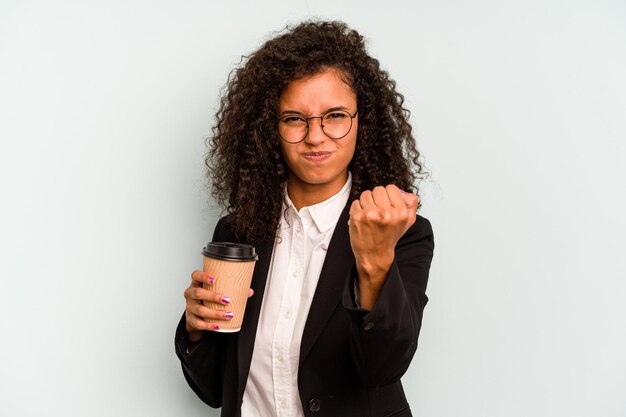 Showing fist to camera aggressive facial expression