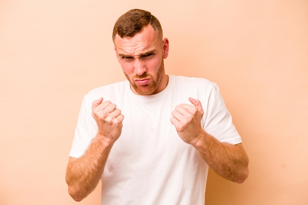 Showing fist to camera aggressive facial expression