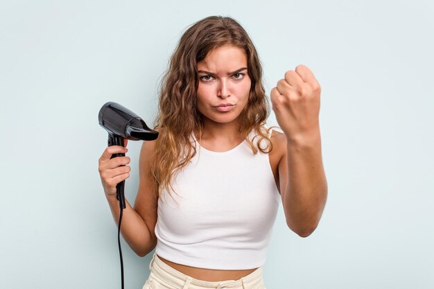 Showing fist to camera aggressive facial expression