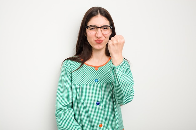 Showing fist to camera aggressive facial expression