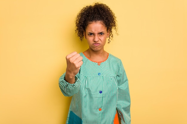 Showing fist to camera aggressive facial expression