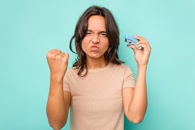 Showing fist to camera aggressive facial expression