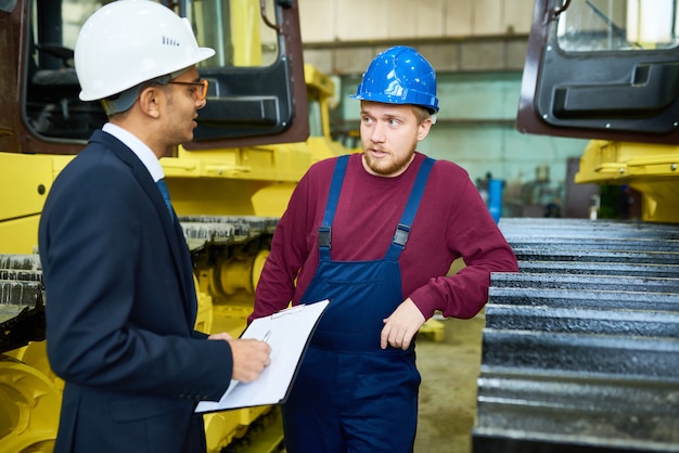 Showing Heavy Equipment to Customer