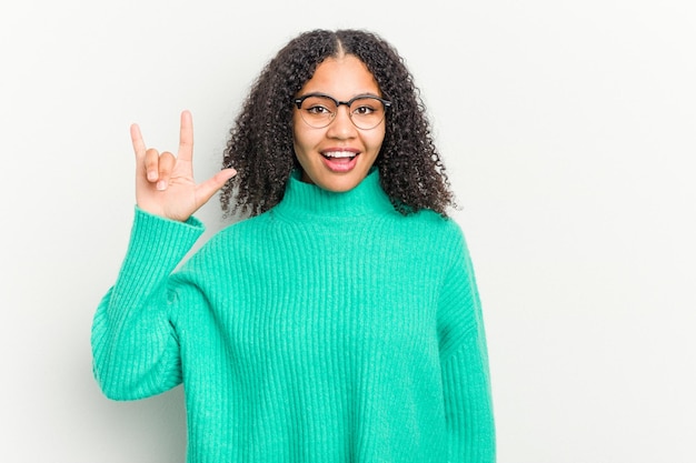 Showing a horns gesture as a revolution concept